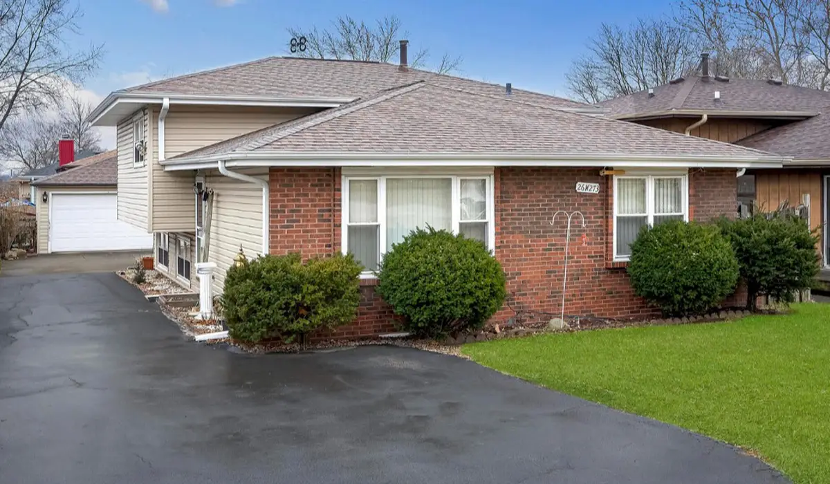 Single-family tri-level home nestled in the unincorporated Milton Township.